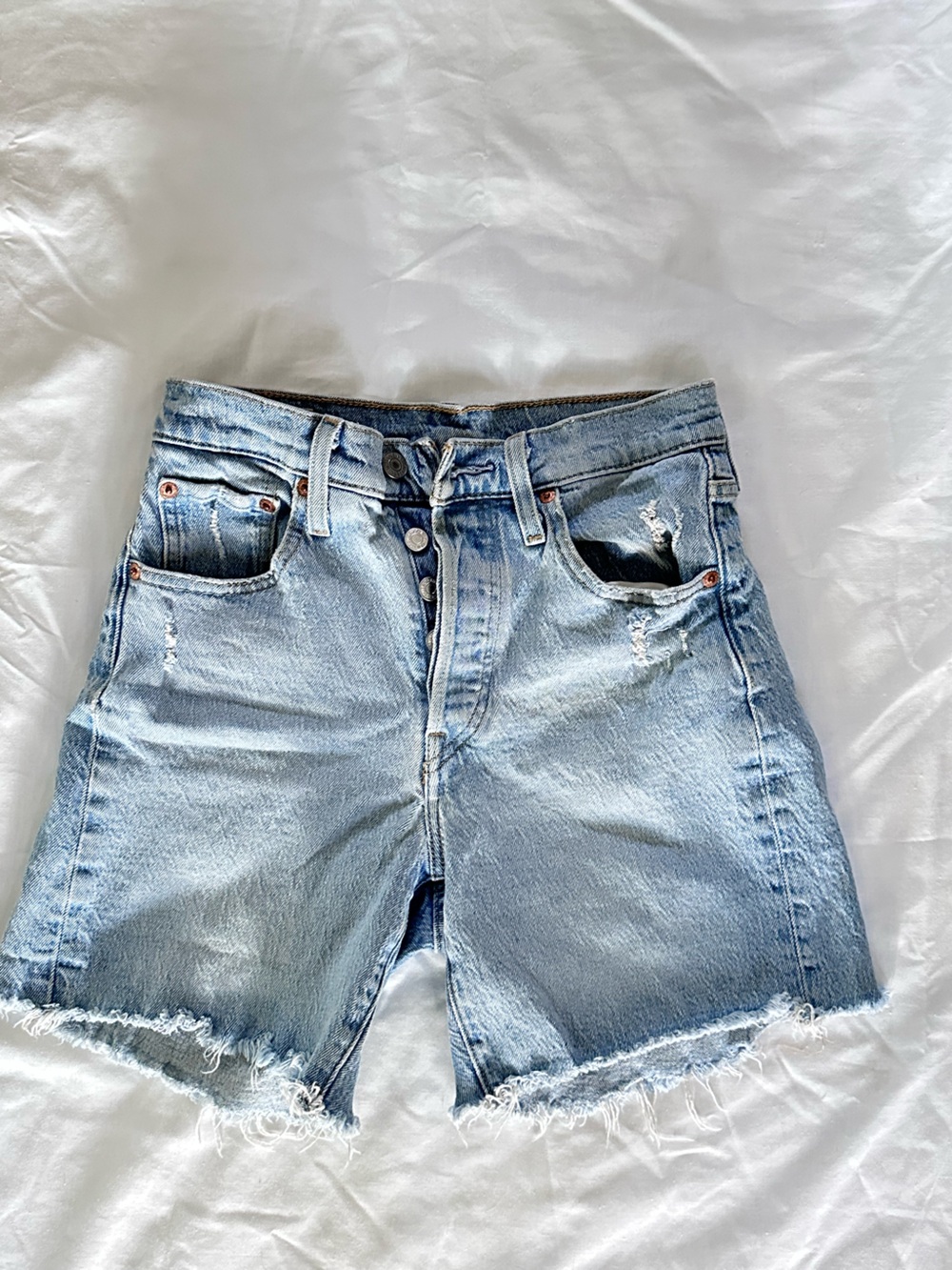 Levi's Light Wash Frayed Hem women’s
Denim Shorts